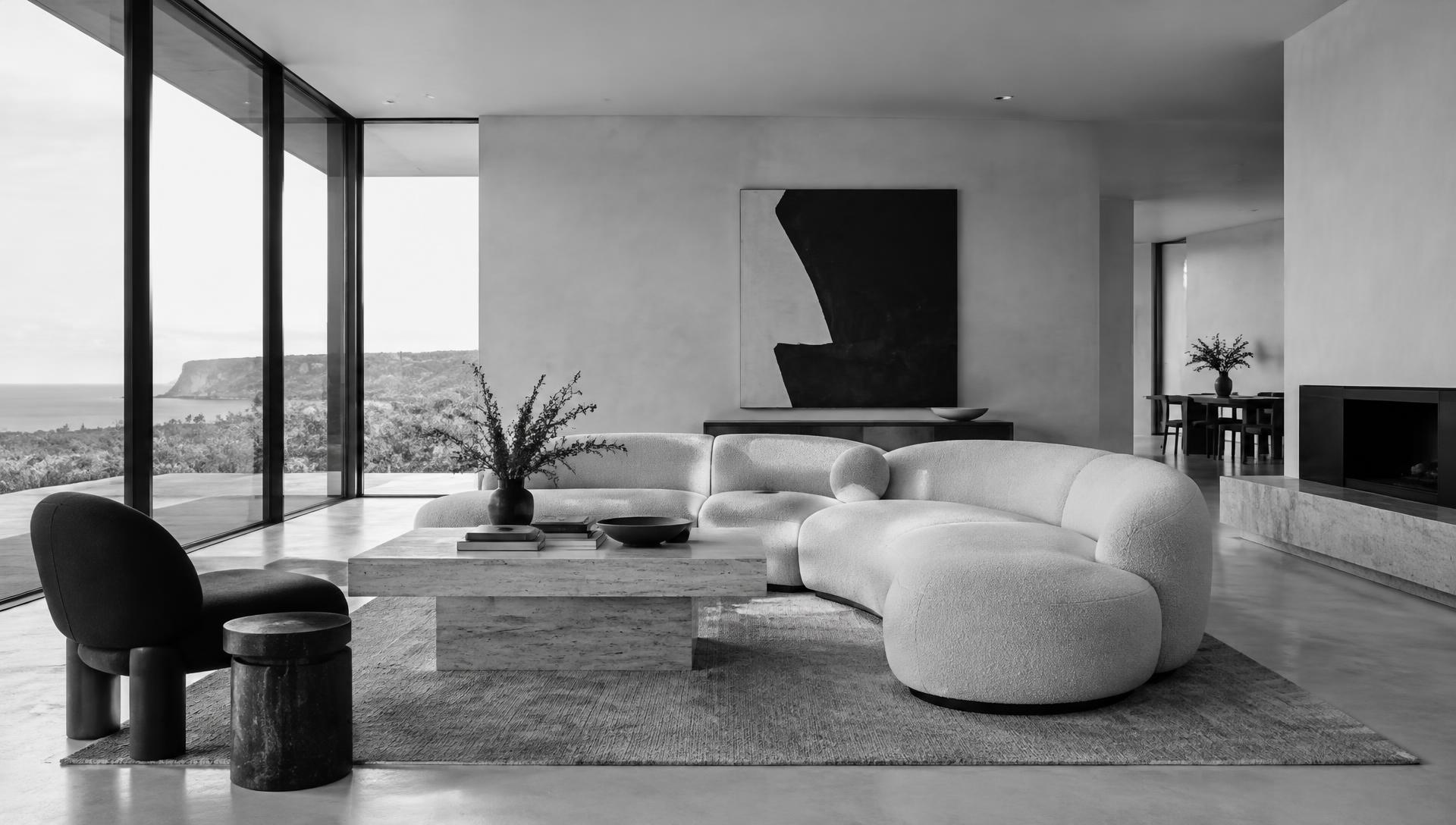 Contemporary living room with curved sofa and floor-to-ceiling windows
